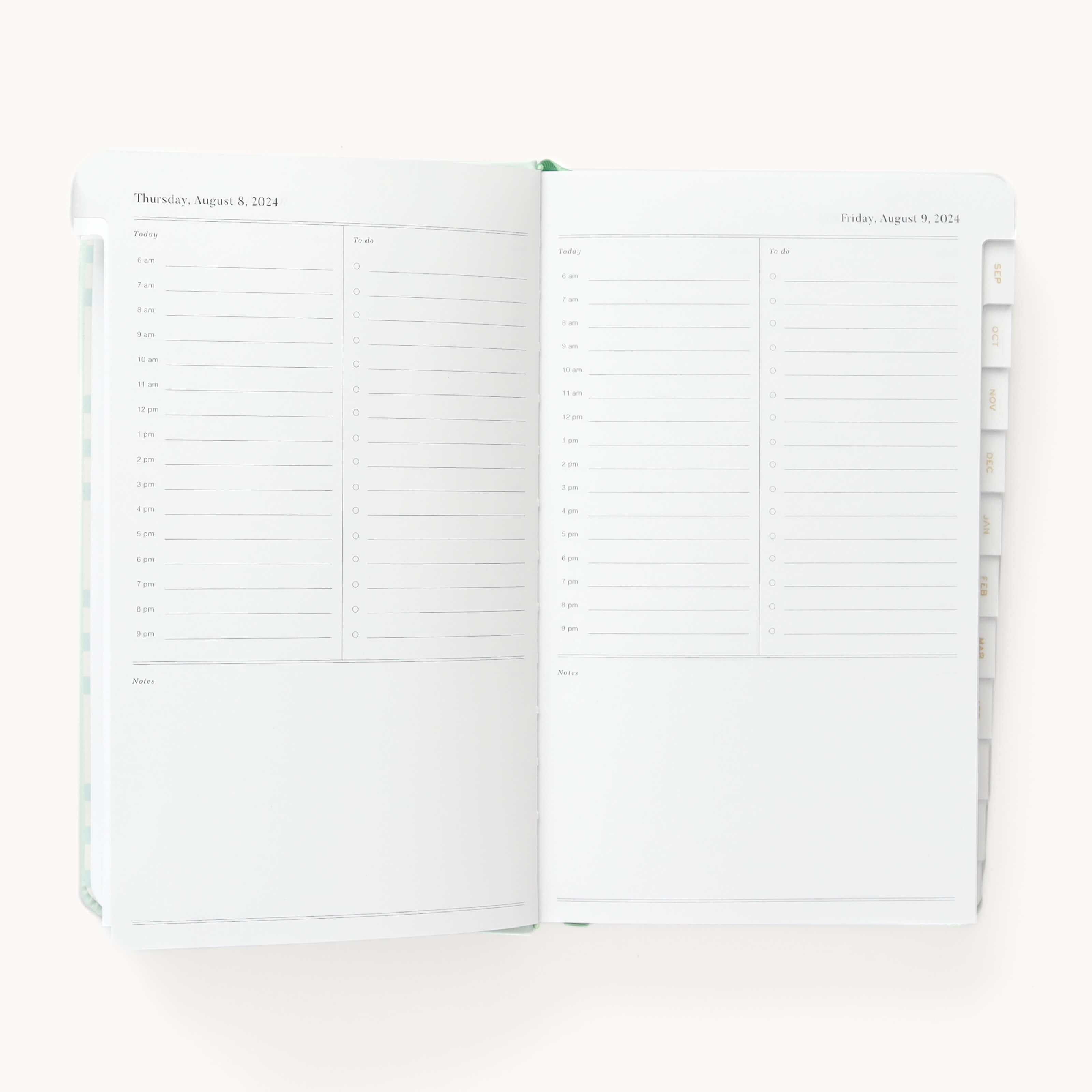 2024-2025 Daily Dapperdesk Planner by Emily Ley in the Sea Salt leatherette cover open to a two-page daily spread featuring Thursday and Friday. Features a clean, minimalistic design with lined sections for daily tasks, to-do lists, and notes.