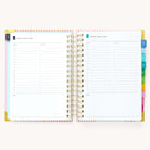 2024-2025 Daily Simplified Planner by Emily Ley in the Cabana Pinstripe cover design open to a two-page daily spread featuring Monday and Tuesday. Features a clean, minimalistic design with lined sections for daily tasks, to-do lists, and notes. Includes color-coded weekday labels, durable spiral binding, and gold corner protectors. 