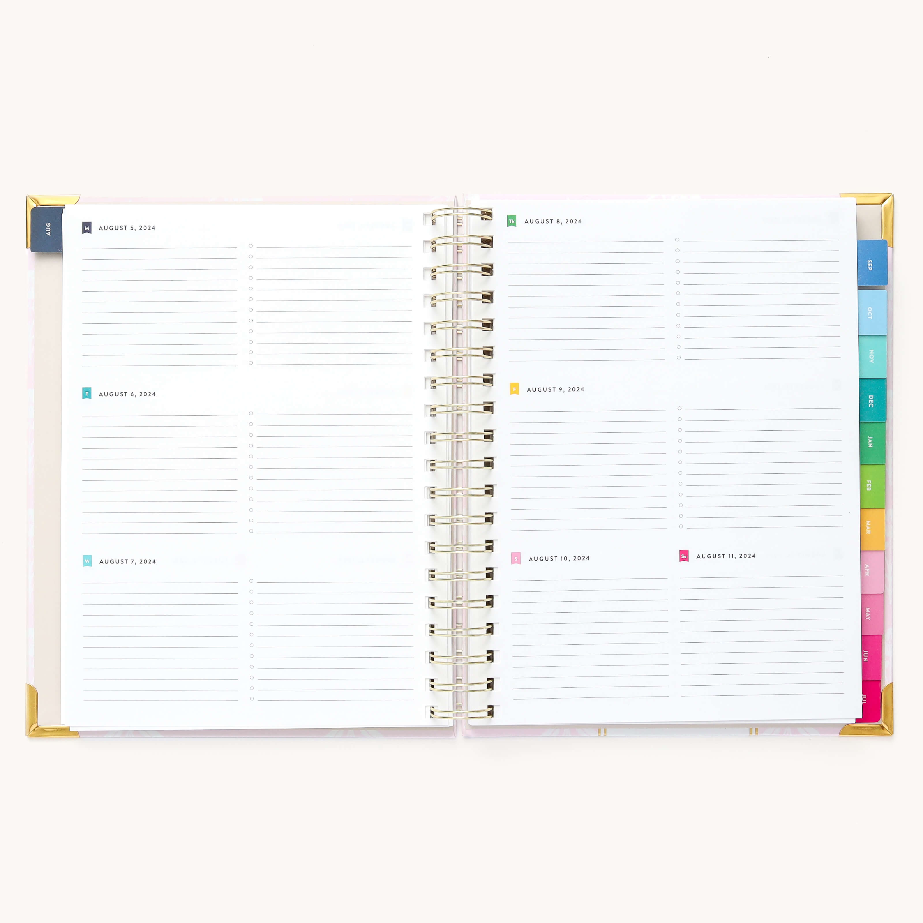 2024-2025 Weekly Simplified Planner by Emily Ley in the Blush Block cover design open to a two-page weekly spread. Features a clean, minimalistic design with lined sections for daily tasks, to-do lists, and notes. Includes color-coded weekday labels, durable spiral binding, and gold corner protectors. 