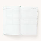 2024-2025 Daily Dapperdesk Planner by Emily Ley in the Sea Salt leatherette cover open to a two-page daily spread featuring Saturday and Sunday. Features a clean, minimalistic design with lined sections for daily tasks, to-do lists, and notes.