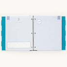 Open the Big Kid Book - Teal by Simplified: The left page, Three Years Old, includes spaces for growth details and favorites, while the right page, A Letter to You, provides lined paper for heartfelt writing. A memorable teal polka dot background enhances the pages charm.