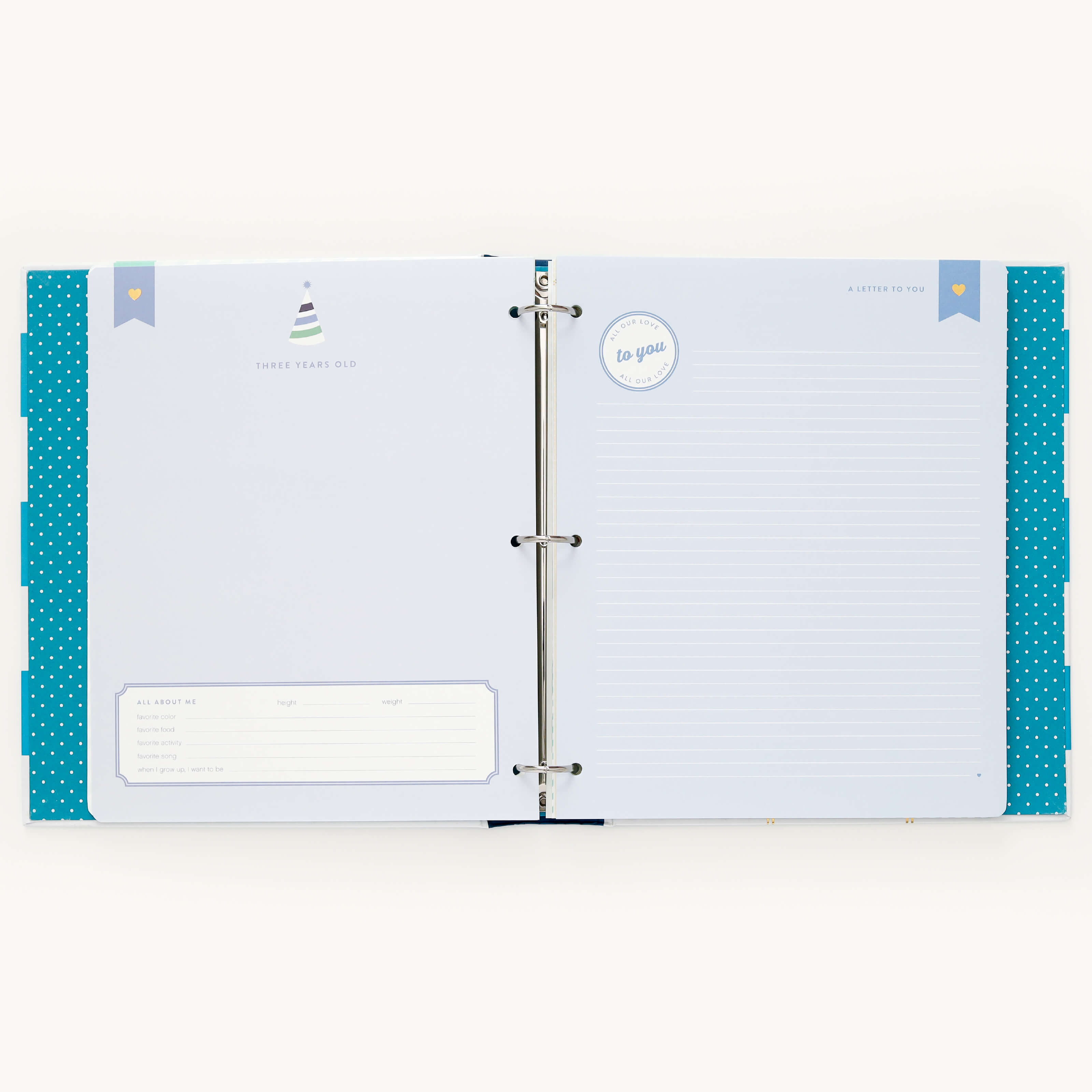 Open the Big Kid Book - Teal by Simplified: The left page, Three Years Old, includes spaces for growth details and favorites, while the right page, A Letter to You, provides lined paper for heartfelt writing. A memorable teal polka dot background enhances the pages charm.