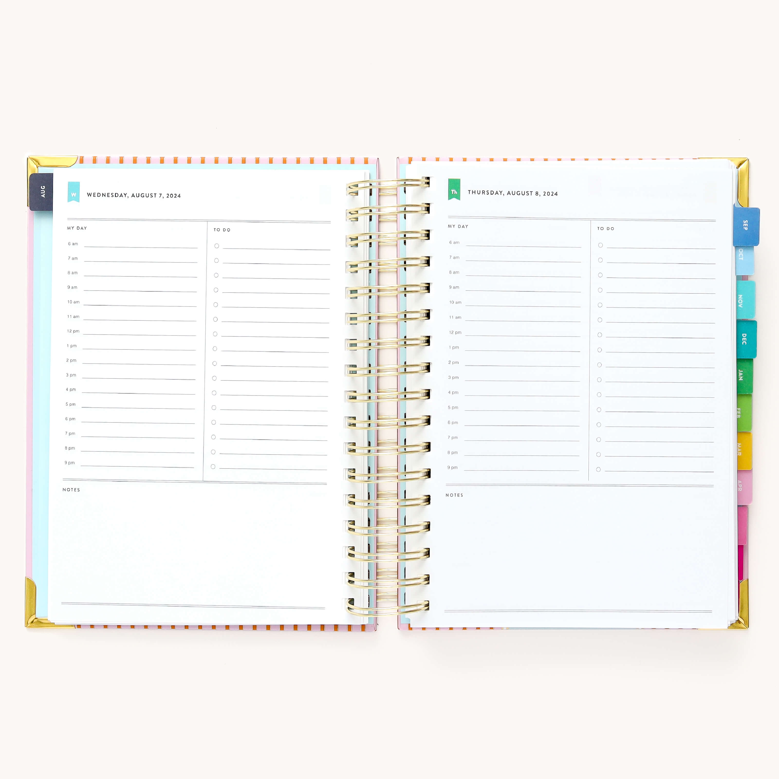 2024-2025 Daily Simplified Planner by Emily Ley in the Cabana Pinstripe cover design open to a two-page daily spread featuring Wednesday and Thursday. Features a clean, minimalistic design with lined sections for daily tasks, to-do lists, and notes. Includes color-coded weekday labels, durable spiral binding, and gold corner protectors. 