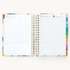 2024-2025 Daily Simplified Planner by Emily Ley in the Savannah Blooms cover design open to a two-page weekend spread. Features a clean, minimalistic design with lined sections for daily tasks, to-do lists, and notes. Includes color-coded weekday labels, durable spiral binding, and gold corner protectors. 