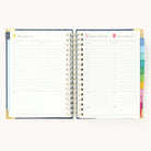 2025 Daily Simplified Planner by Emily Ley in the Dainty Dot cover design open to a two-page weekend spread. Features a clean, minimalistic design with lined sections for daily tasks, to-do lists, and notes. Includes color-coded weekday labels, durable spiral binding, and gold corner protectors. 