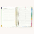 2025 Daily Simplified Planner by Emily Ley in the Pistachio Plaid cover design open to a two-page weekend spread. Features a clean, minimalistic design with lined sections for daily tasks, to-do lists, and notes. Includes color-coded weekday labels, durable spiral binding, and gold corner protectors. 