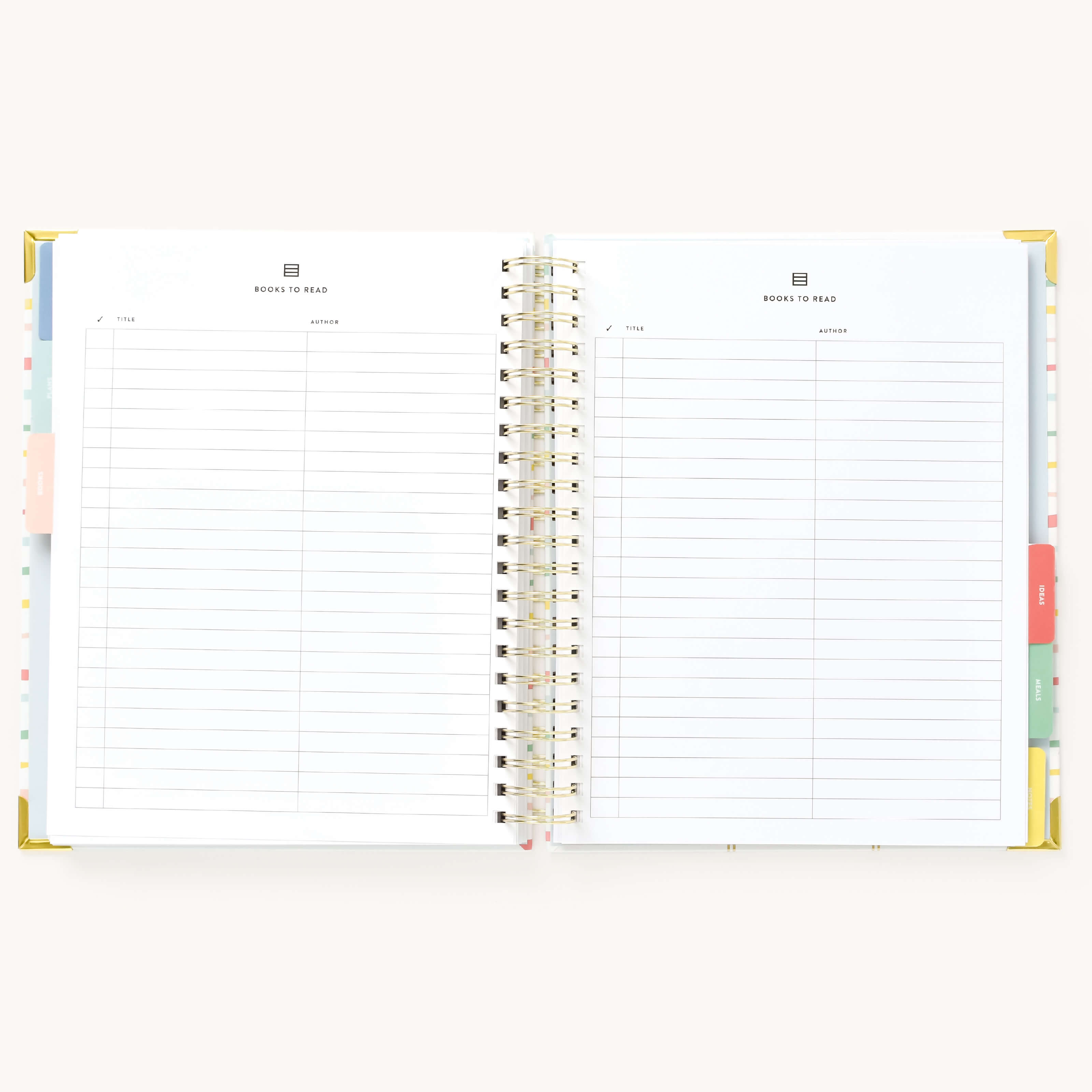 Simplified Planner by Emily Ley open to the Books to Read tracker pages. Features structured sections to log book titles, authors, and reading progress.