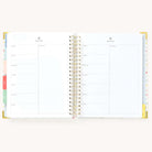 Simplified Planner by Emily Ley open to the Meal Plan pages. Features a structured weekly meal planning layout with sections for daily meals and a dedicated grocery list space, designed for organized meal prep and efficient shopping.