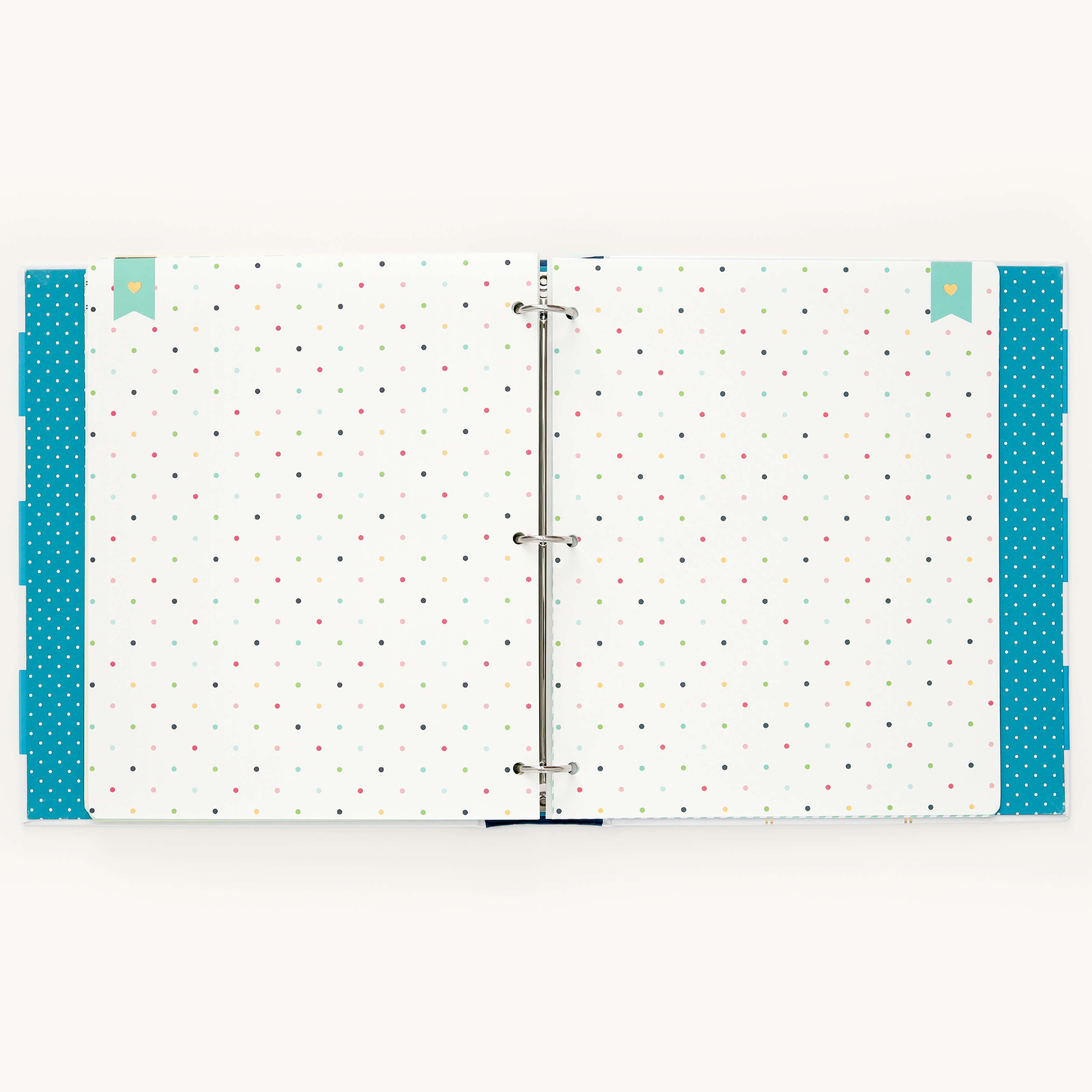 The Big Kid Book - Teal by Simplified is an open ring binder with a polka dot design and teal borders, perfect for capturing child growth milestones and adding a playful charm to memorable moments.