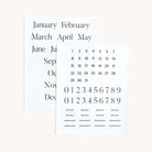 Two minimalist pages on a light background feature the Simplified Cling Sticker Set - Months. One lists January to December for monthly labeling, while the other includes numbers and words like BIRTHDAY and APPOINTMENT, perfect for customizing an acrylic wall calendar.