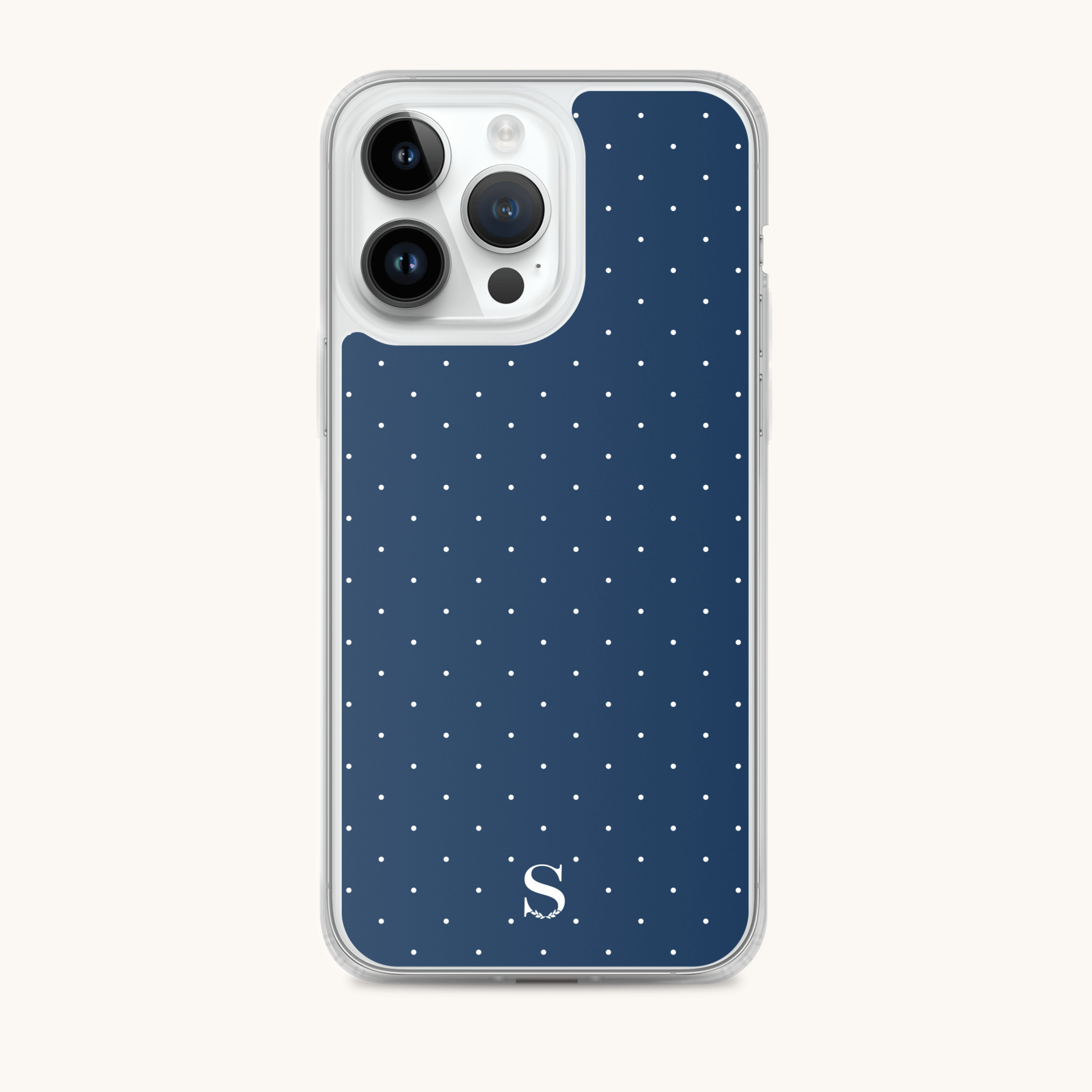 The Simplified iPhone Case - Dainty Dot offers a stylish blue design with small white polka dots and a letter S at the bottom. It provides protection while featuring transparent sides around the camera to highlight the lenses.