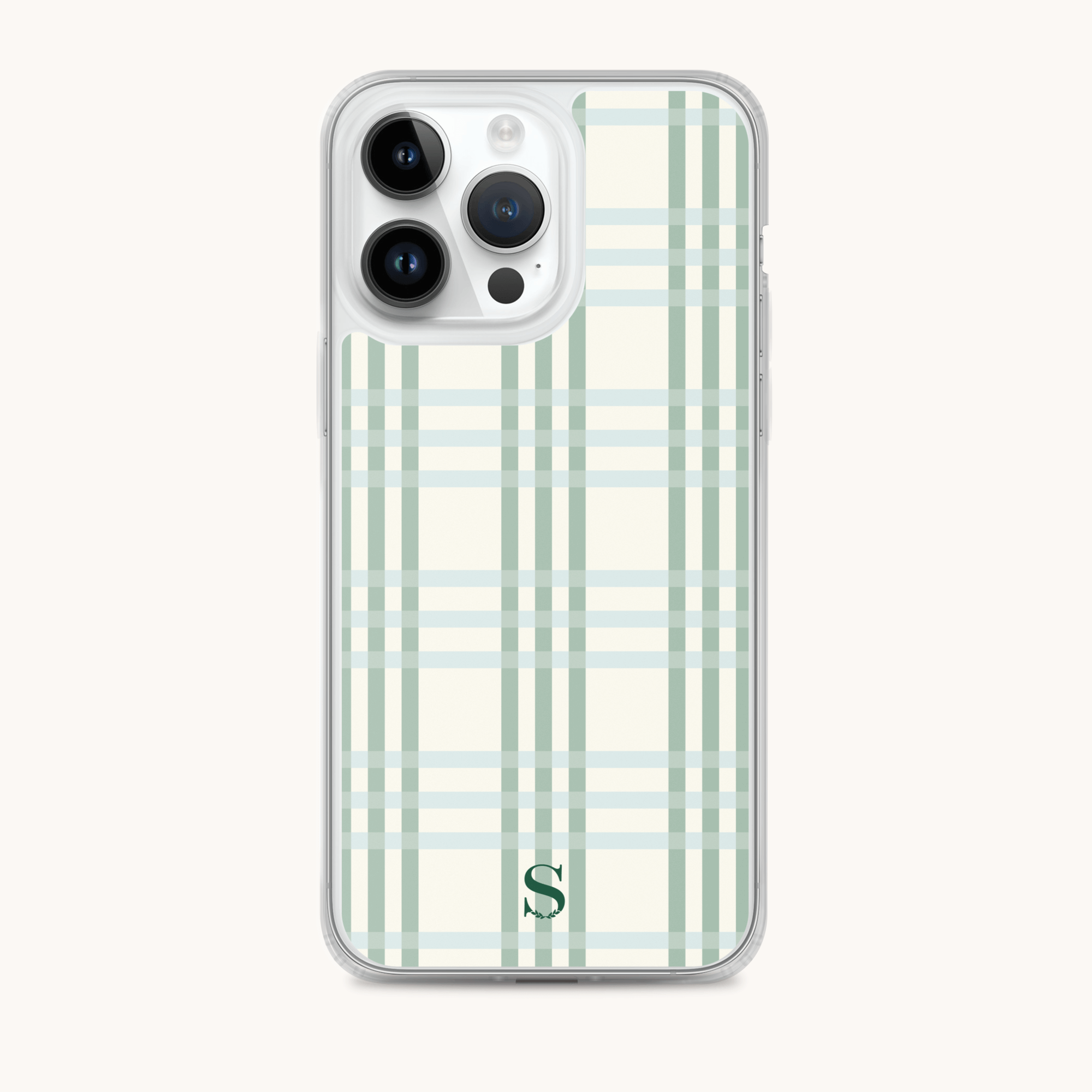 An iPhone in a chic Simplified Pistachio Plaid case showcases a green/beige plaid pattern with an S logo at the bottom. The phone features three rear camera lenses and a flash.