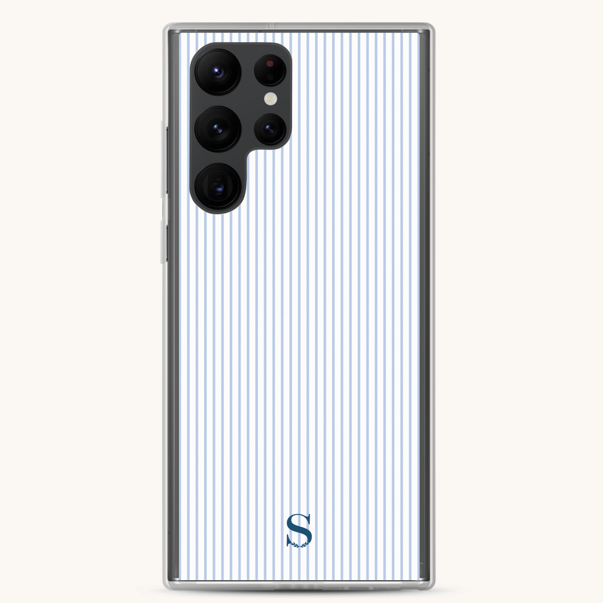 The Samsung Case - Coastal Stripe by Simplified features stylish silver edges, a multi-lens camera setup, and an elegant design with vertical blue and white stripes. It also displays an S at the bottom center, providing both protection and style for your phone.