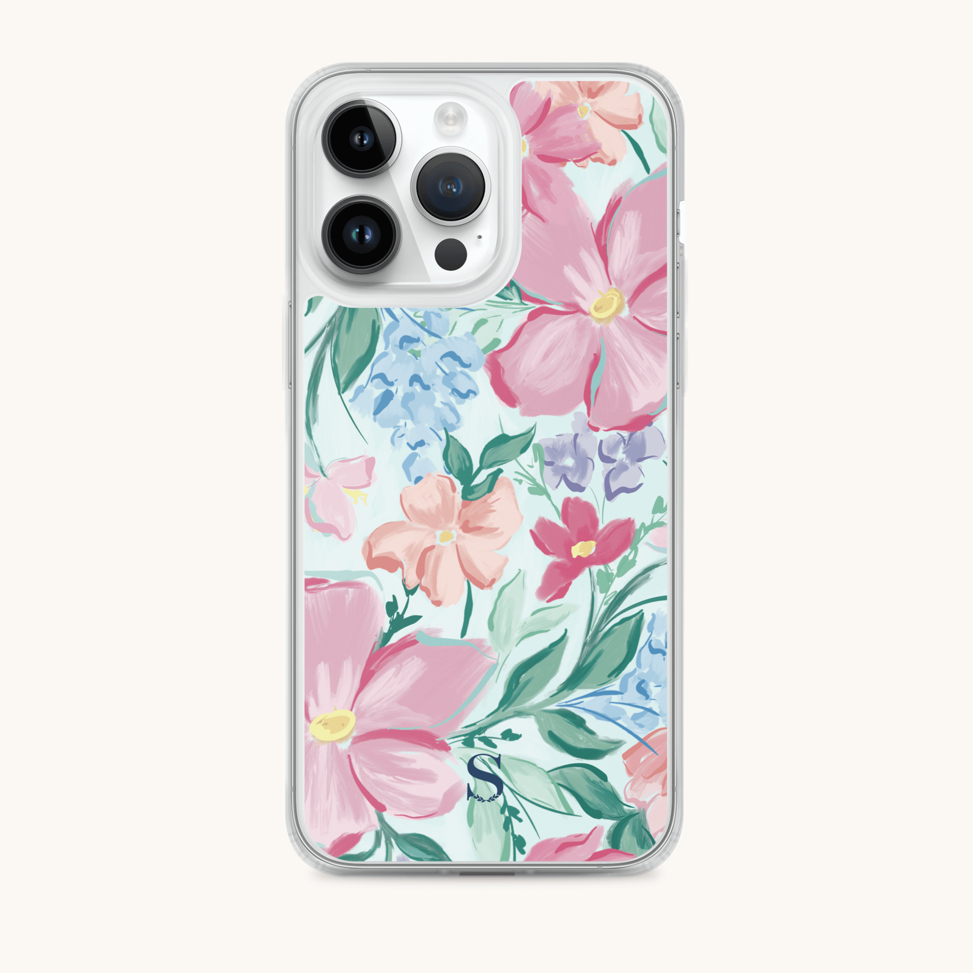 A smartphone encased in the stylish Simplified iPhone Case - Blush Magnolia featuring large pink and peach blooms, blue accents, and green leaves. Its clear border highlights the cameras while protecting your phone with elegance.